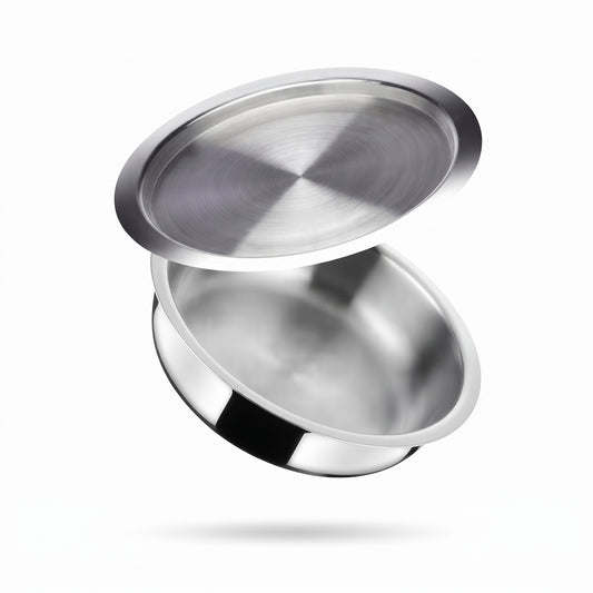 A stainless steel bowl with its matching lid floating above it, shown against a clean white background with a soft shadow underneath.